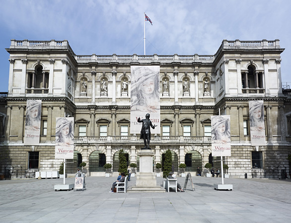 The Royal Academy with the statue of it's founder Joshua Reynolds in the front, London, UK. London Art Museums