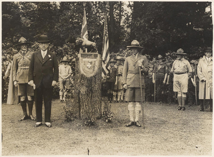 The Bronze Buffalo presentation ceremony. In attendance (left to right): Robert Baden-Powell, the American Ambassador Alanson B. Houghton, and Chief Scout of Wales, HRH Edward, Prince of Wales (later King Edward VIII).