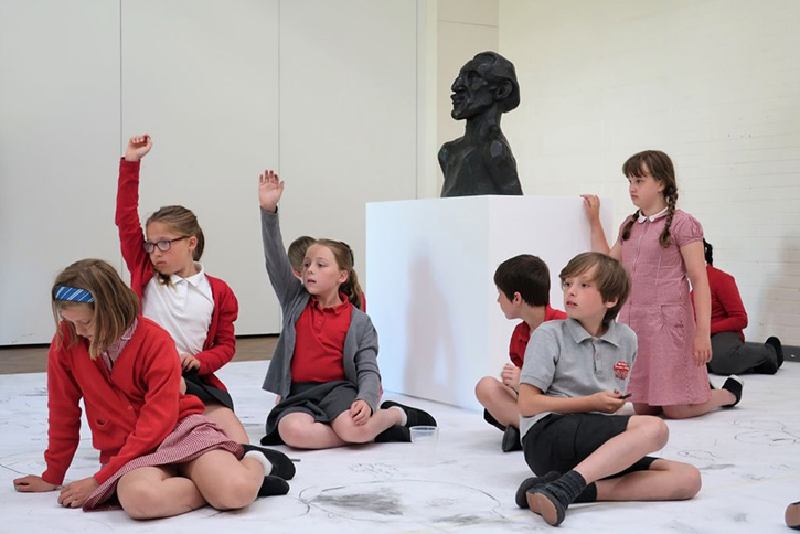 Pupils from Weetwood Primary School, Leeds, take part in large-scale drawing workshops