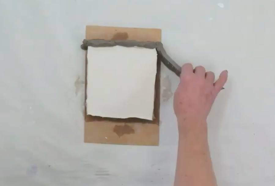 Removing the clay from the plaster mould