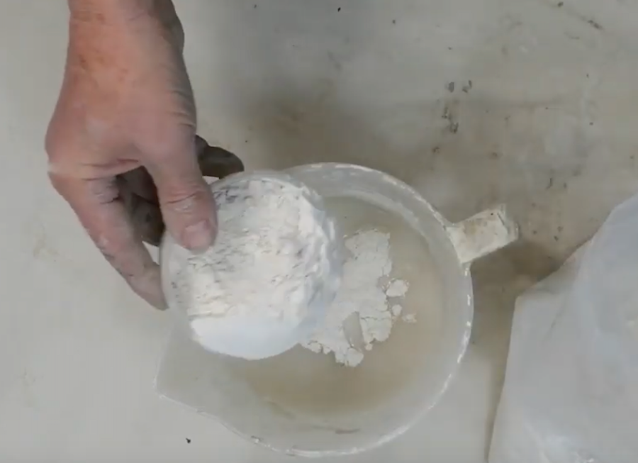 Adding plaster to the water