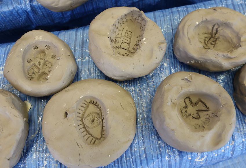 Clay moulds with incised designs