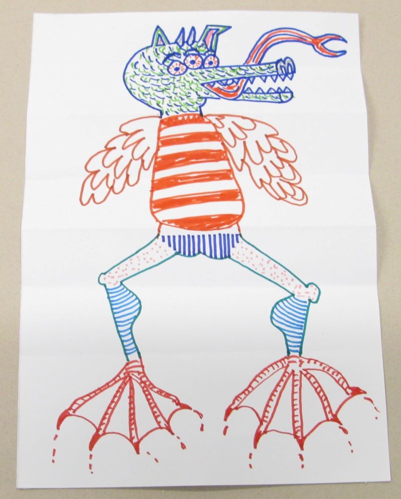 Unfold the paper to reveal your surprise monster drawing!