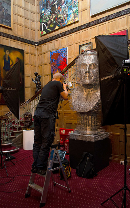 Luke Unsworth photographing sculpture at Wolverhampton Art Gallery