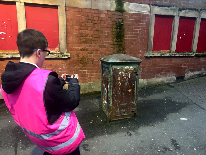 Group members taking photographs around Longton town centre