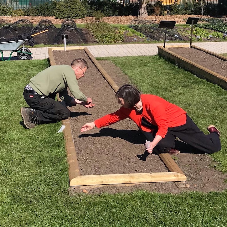 Christine Borland sowing for 'In Relation to Linum' at the Royal Botanic Garden Edinburgh, 2021