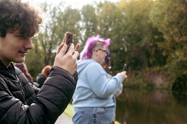 Pinc College students photographing autumnal landscapes along the Caldon Canal
