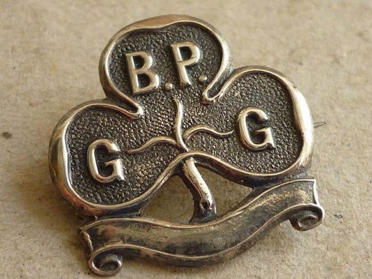 The first Guides' Promise badge, designed by Agnes Baden-Powell