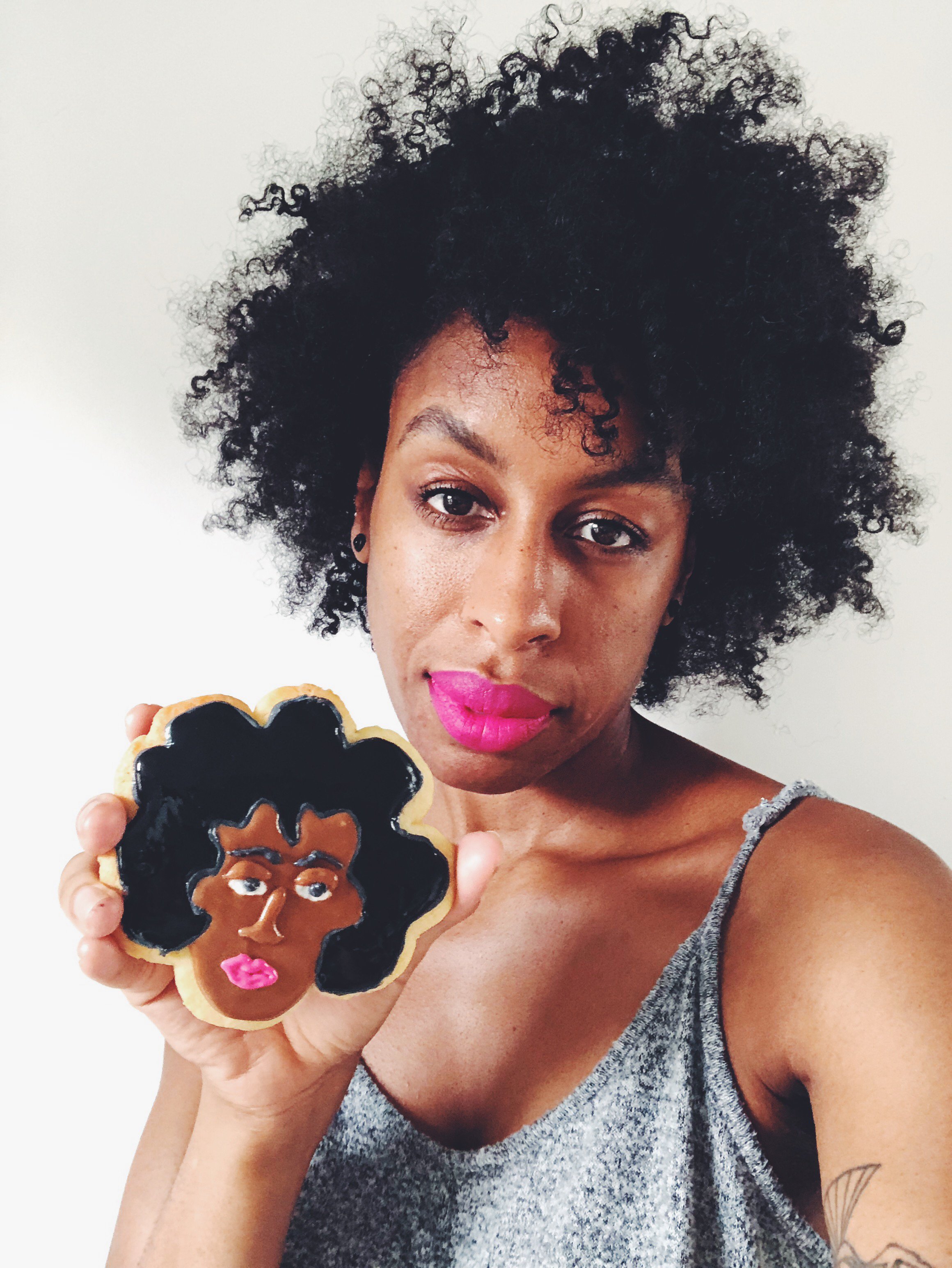 Art UK's very own Ferren Gipson and her self portrait in biscuit form