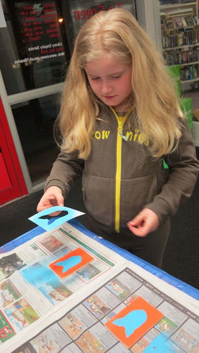 A Harlow Brownie making cards at Tye Green Library