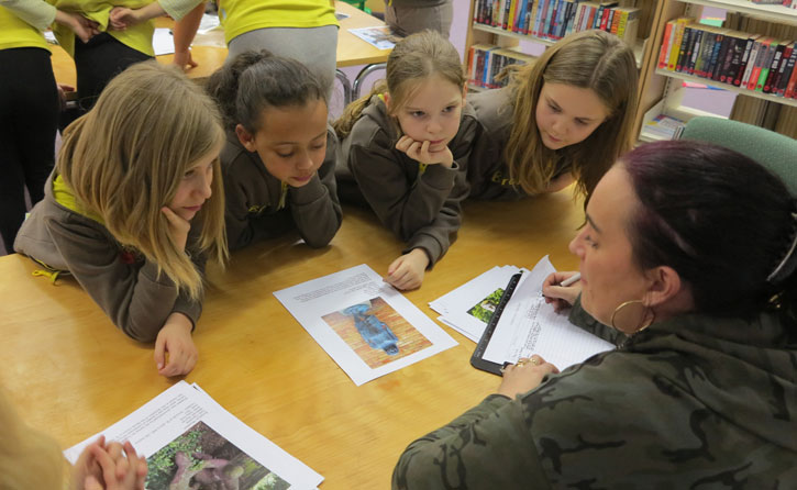 Harlow Brownies selecting sculptures in a workshop in Tye Green Library, Harlow