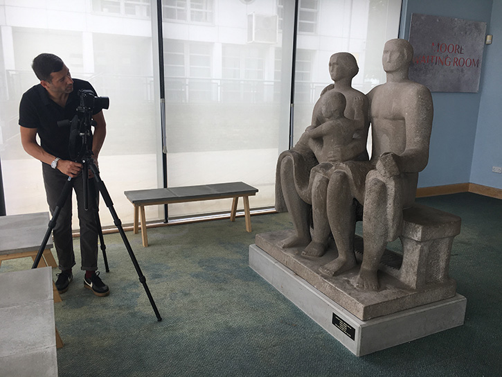 Jaron James photographing Henry Moore's 'Harlow Family Group'