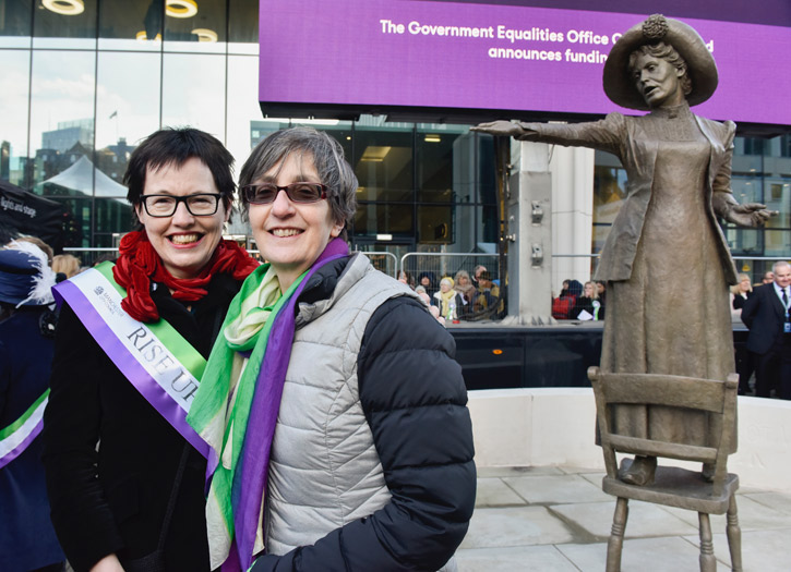 In front of the statue ‘Rise Up Women’, depicting Emmeline Pankhurst, St Peter’s Square, Manchester, by Hazel Reeves, erected 2018