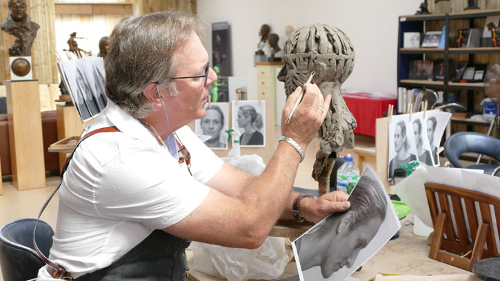 Sculptor Andrew Sinclair at work