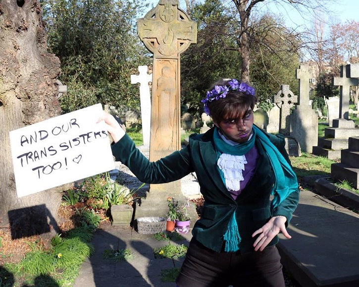 Claire as Eugène Delacroissant performing in front of Emmeline Pankhurst's memorial