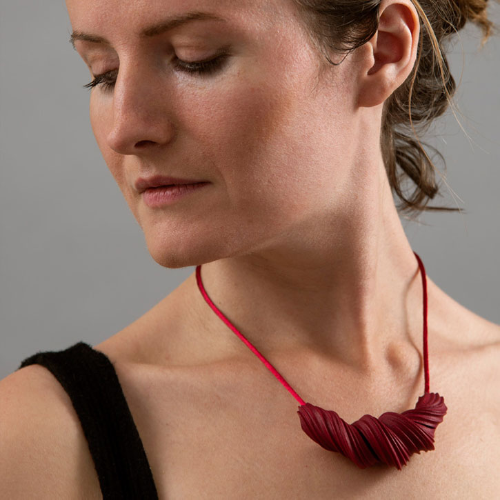Lynne MacLachlan's ‘Peplos’ necklace in burgundy red