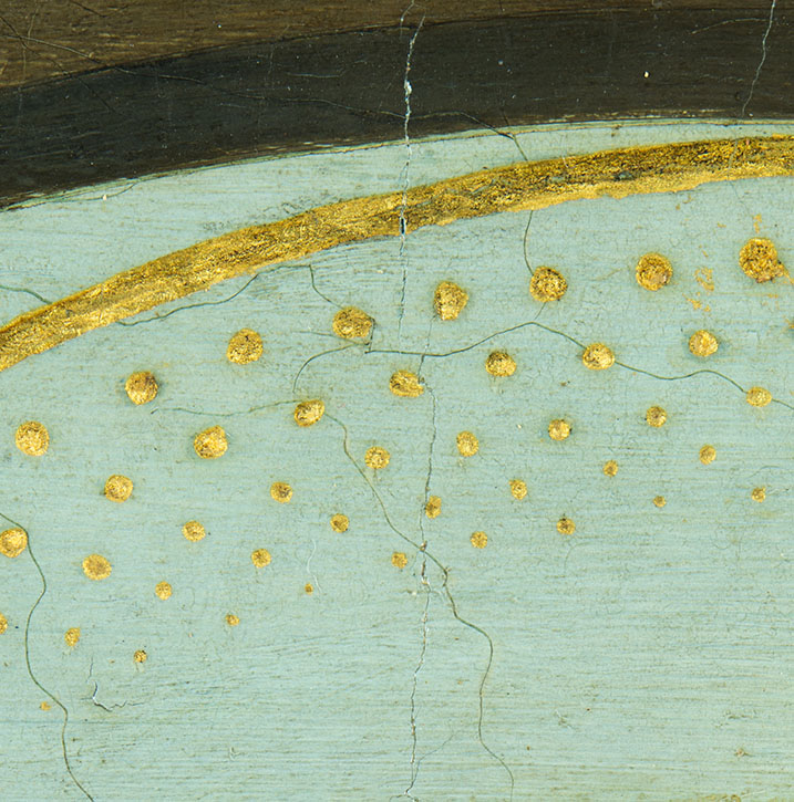 Detail of 'Virgin and Child with a Pomegranate', showing fake cracks