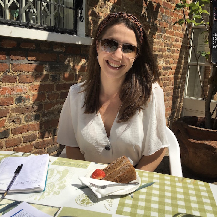 Gemma at Guildford House Gallery Café with a slice of coffee cake