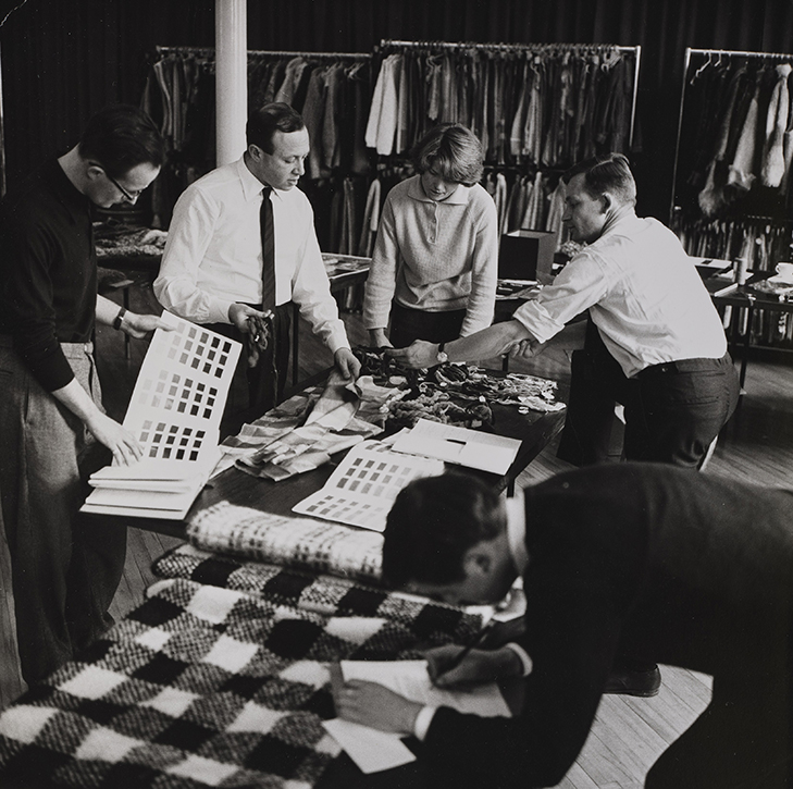 Bernat Klein selecting cloth and yarn samples