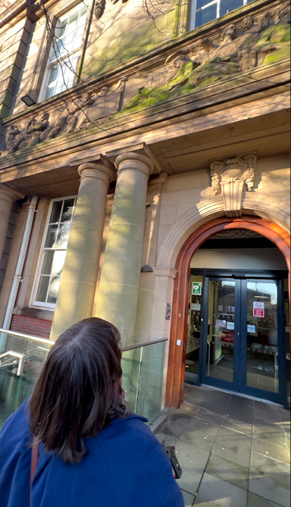 Anna Francis in front of the Cadman Building, University of Staffordshire