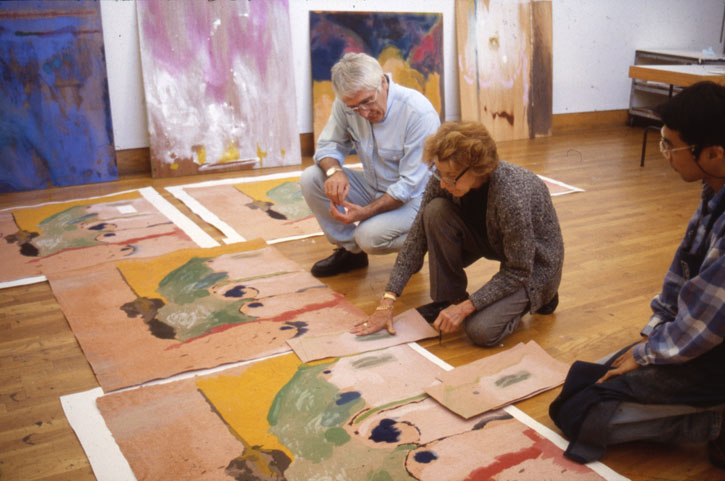 Kenneth Tyler, Helen Frankenthaler and Yasuyuki Shibata inspect proofs of 'Tales of Genji I' in the Tyler Graphics studio, 1997