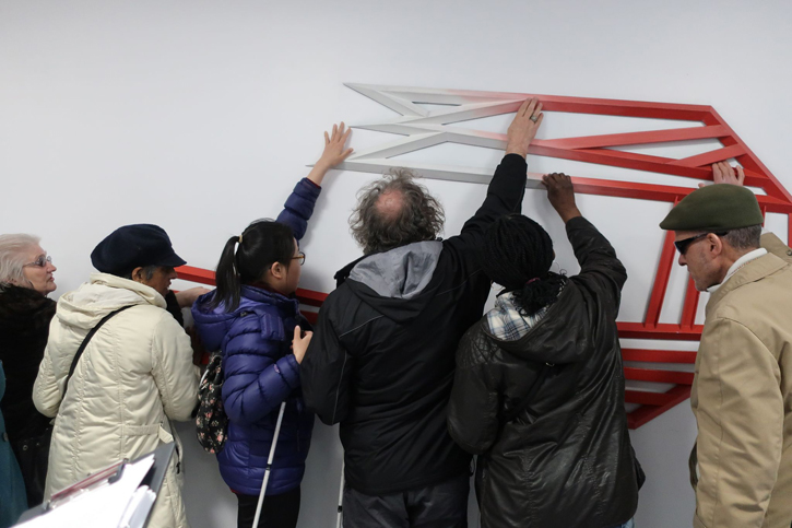 Participants explore sculpture at St George’s Hospital, Tooting