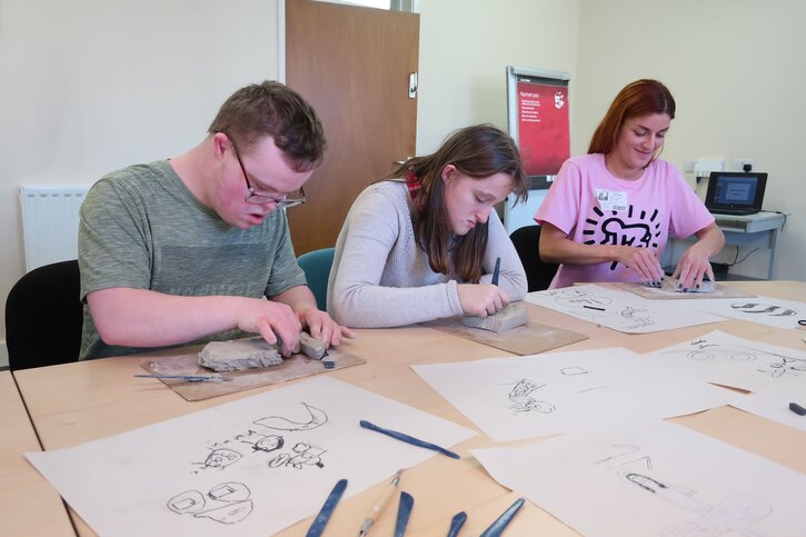 Tullie House’s Community & Young Person Coordinator Lindsey Atkinson works along James Rennie pupils