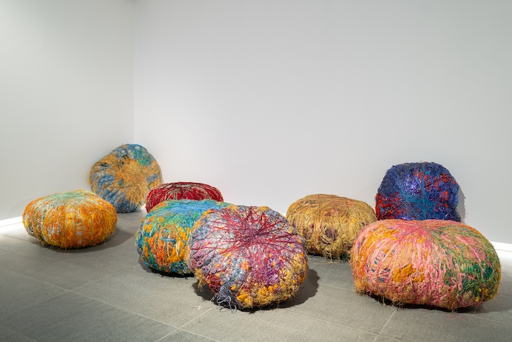 Installation view, Sheila Hicks, ‘Grand Boules’ (2009) at Tate Liverpool + RIBA North, 2025