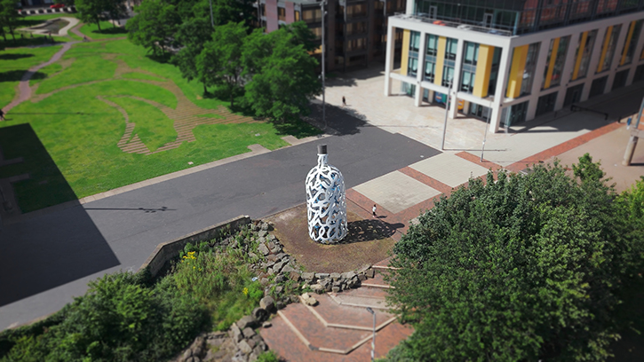 Still from HENI Talks' film on Claes Oldenburg's 'Bottle of Notes'