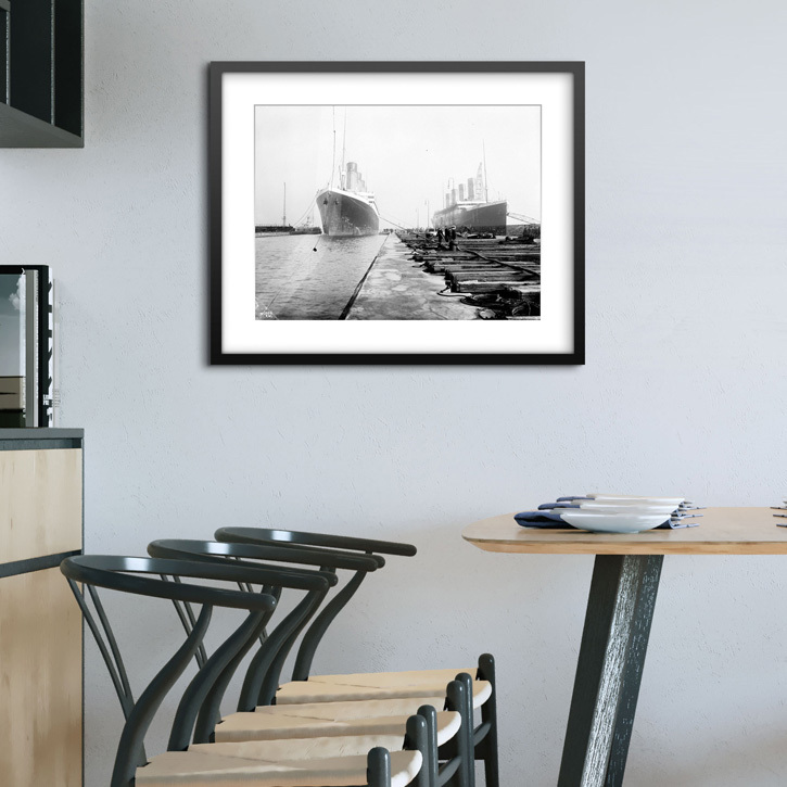 Framed print of 'Bow view entering Thompson Graving Dock with starboard bow view of 'Titanic'