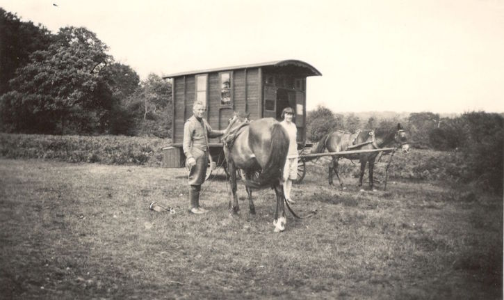 Tom and Margaret Charman with a caravan in fields at Robin's Bush, New Forest, 1927