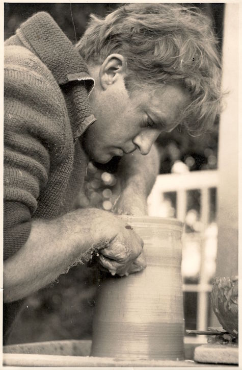 Young Christopher Pan Charman throwing a pot