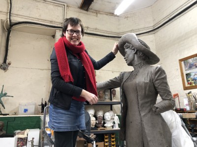Hazel Reeves in her studio with the original clay model for her statue of Emmeline Pankhurst