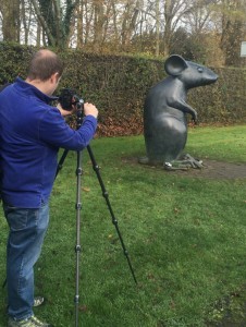 Matt Ward photographing Kenny Hunter's 'Monument to a Mouse'