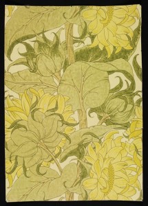 Portion of 'The Cestrefeld' wallpaper, large yellow sunflowers with green foliage, on a pale ground