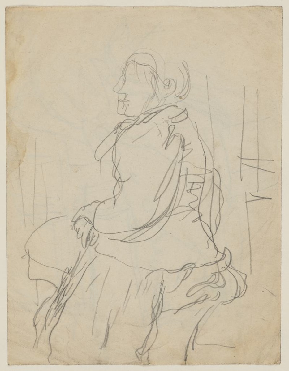Woman seated with umbrella