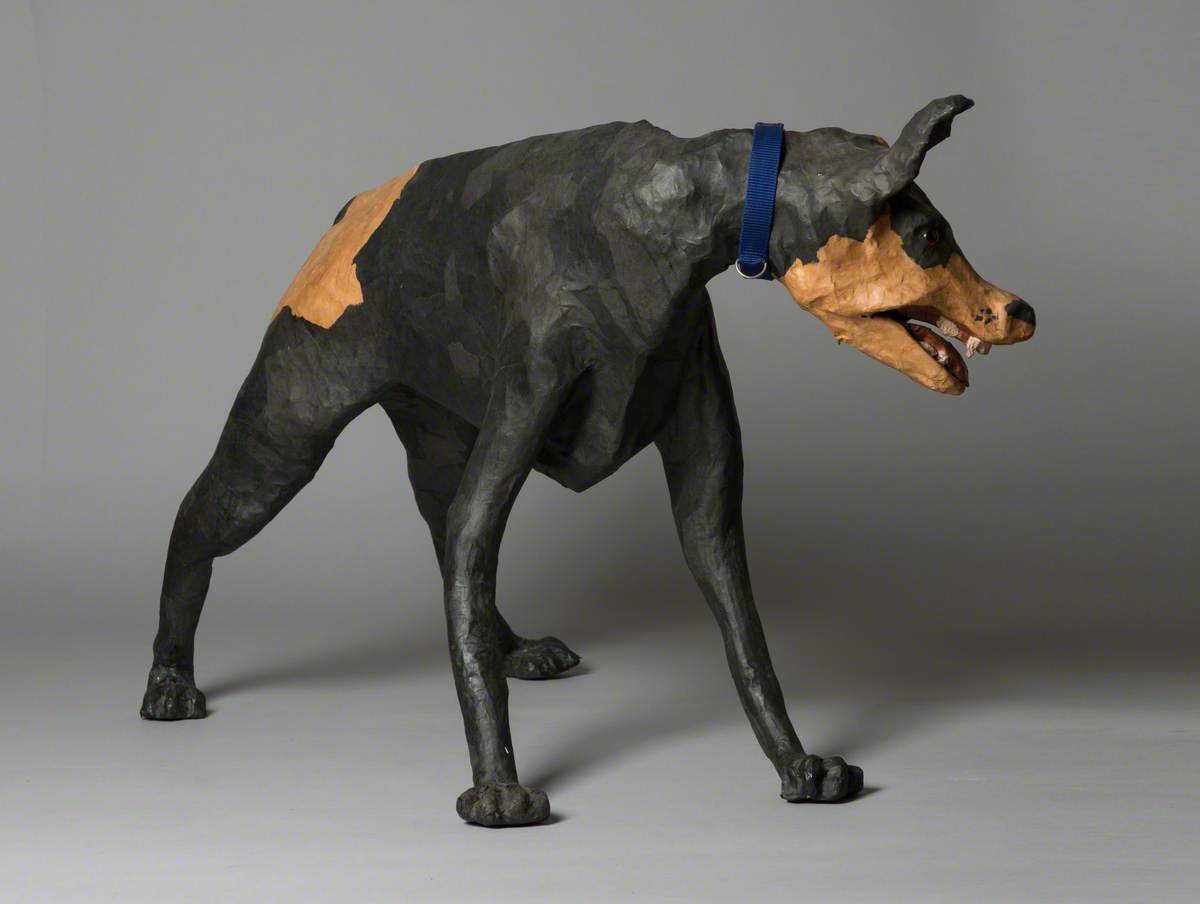 Brown and Black Dog with Blue Collar