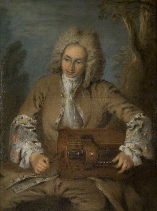A Man Playing a Hurdy-Gurdy