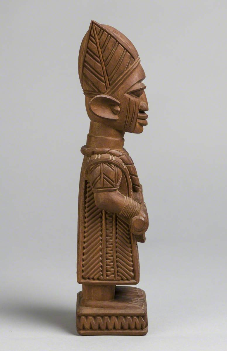 Male Figure with Drum and Headdress