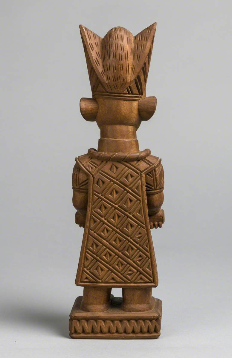 Male Figure with Drum and Headdress