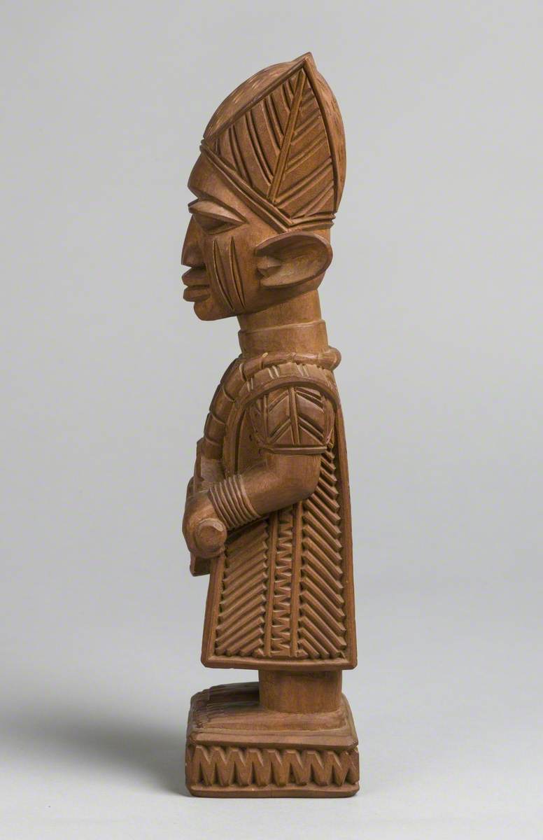 Male Figure with Drum and Headdress