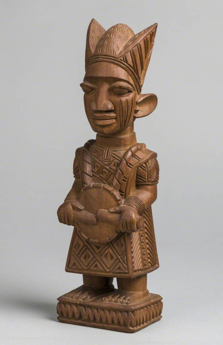 Male Figure with Drum and Headdress