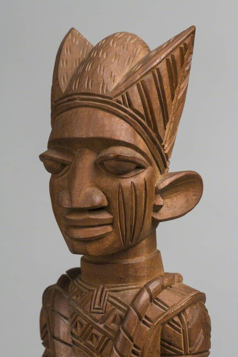 Male Figure with Drum and Headdress