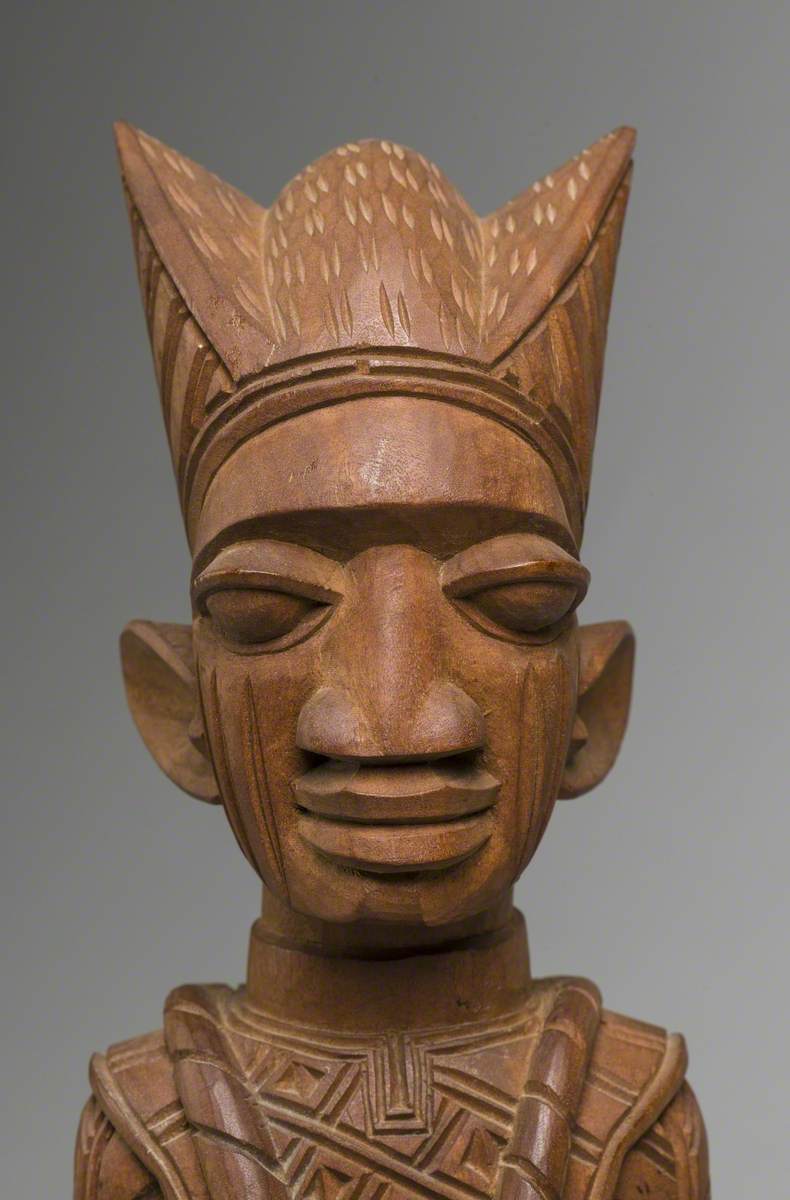 Male Figure with Drum and Headdress