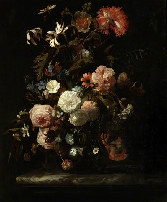 Glass Vase of Mixed Flowers on a Marble Ledge