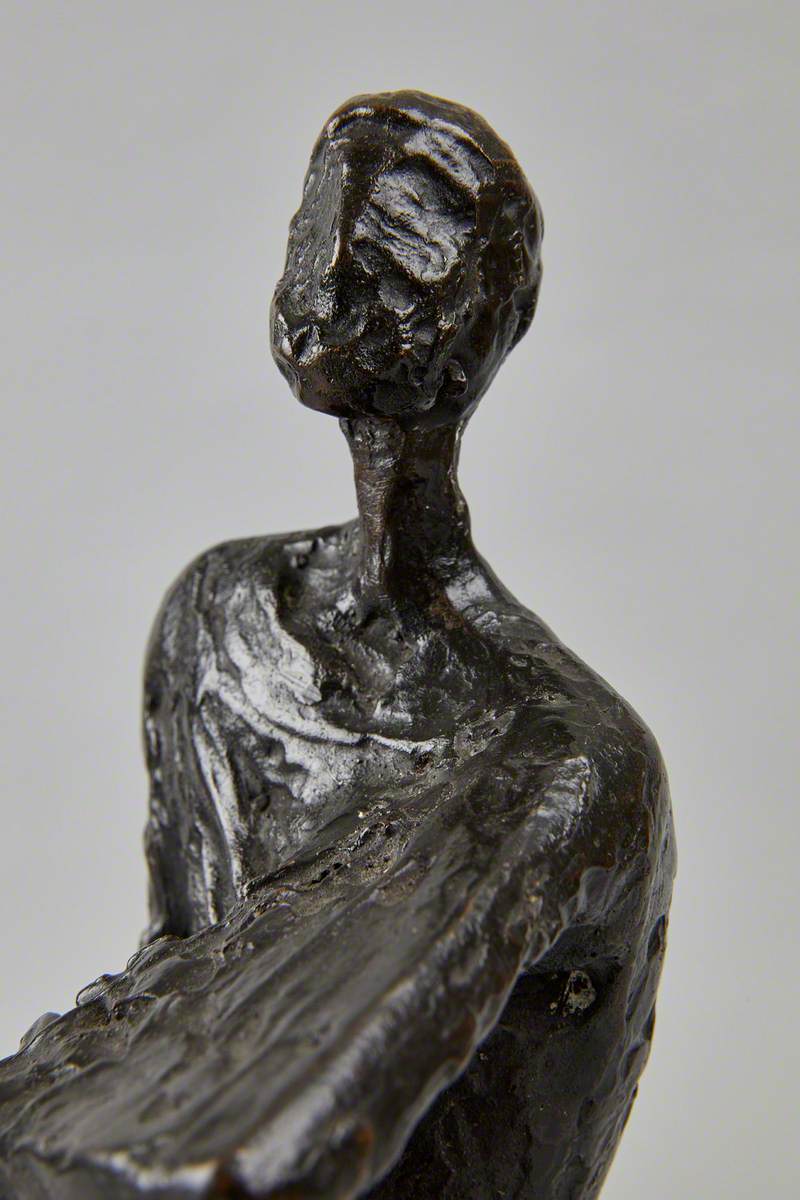 Kneeling Figure