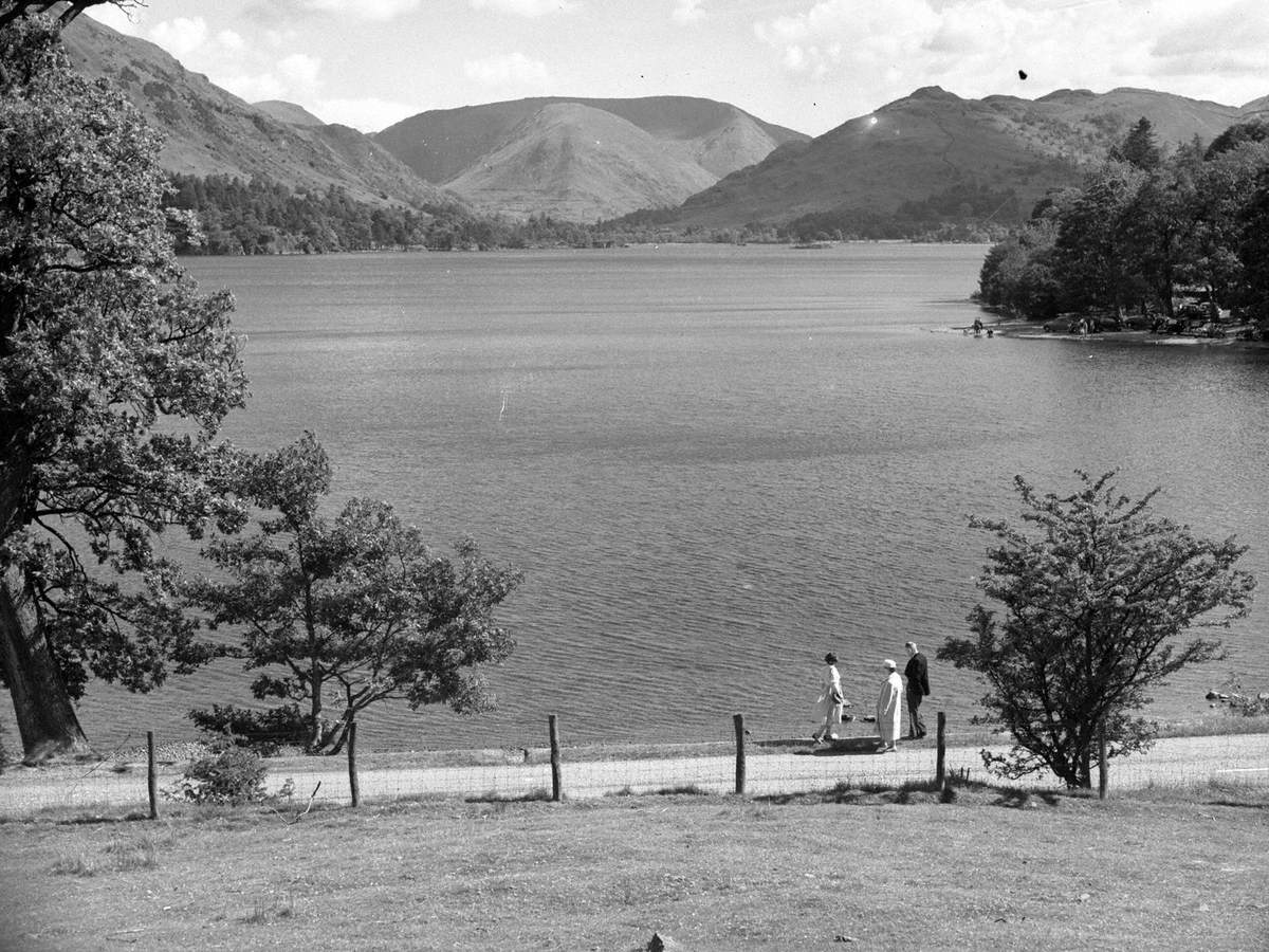 Family Stroll along Lake Edge