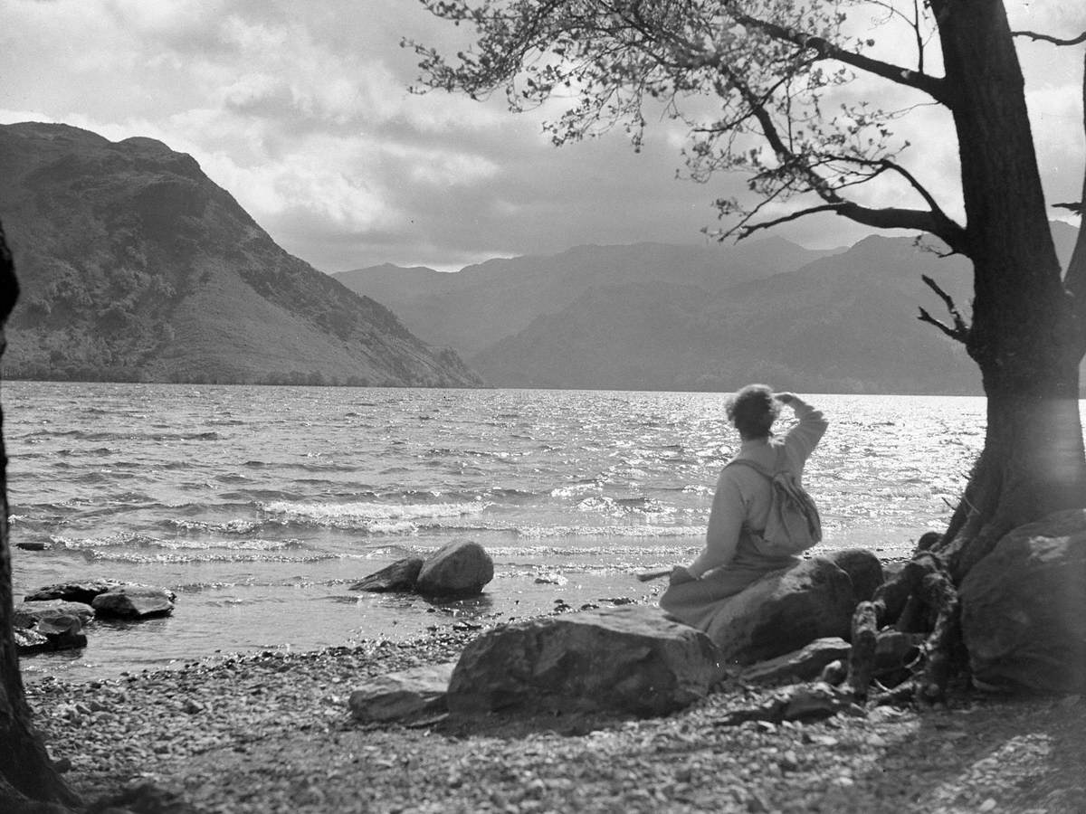 Lady Looking out across Lake