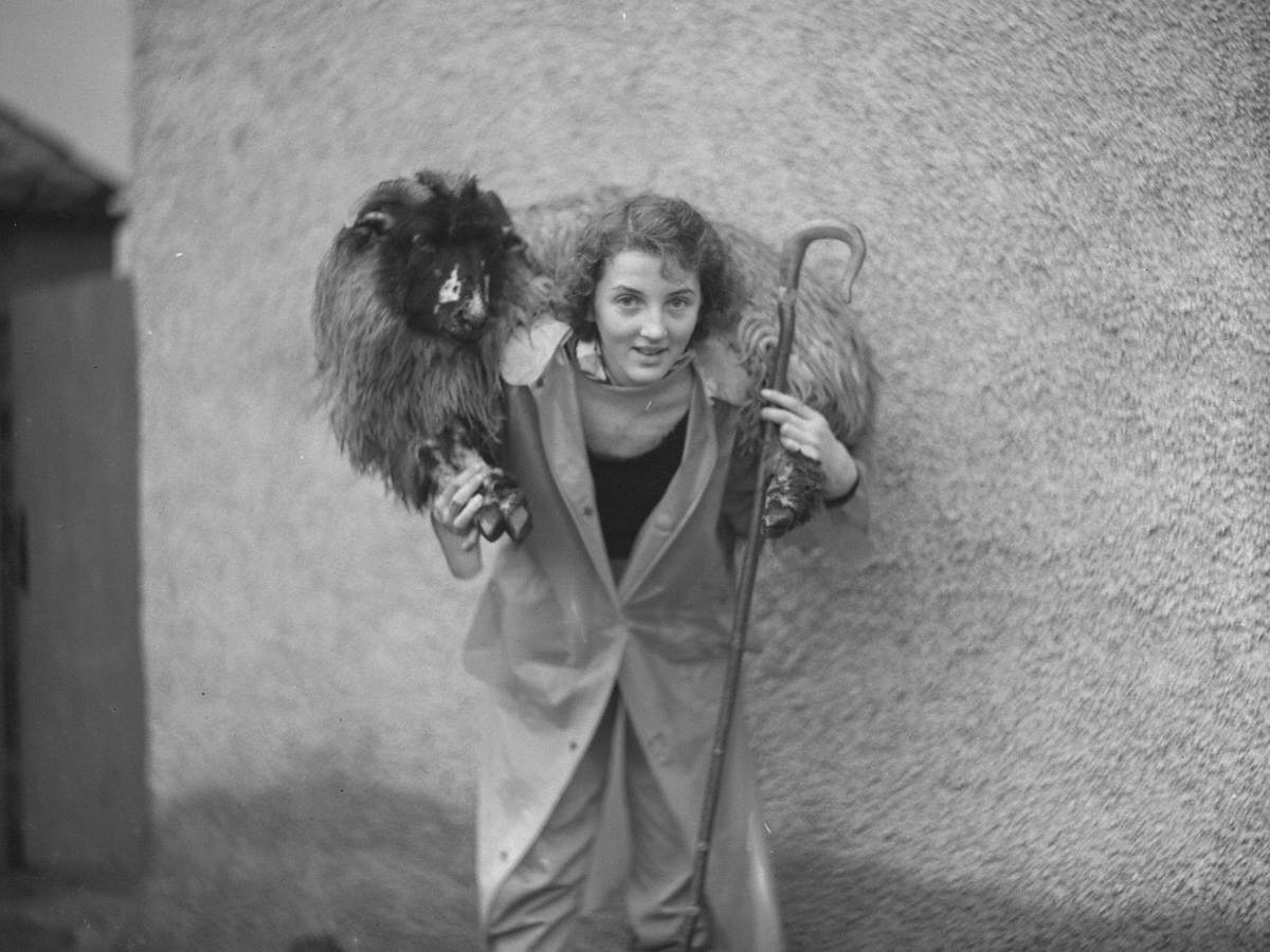 Woman with a Sheep over Her Shoulders