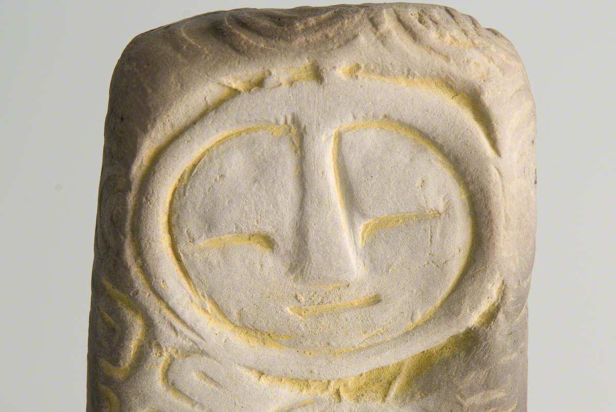 Face Standing Stone with Ring Carving